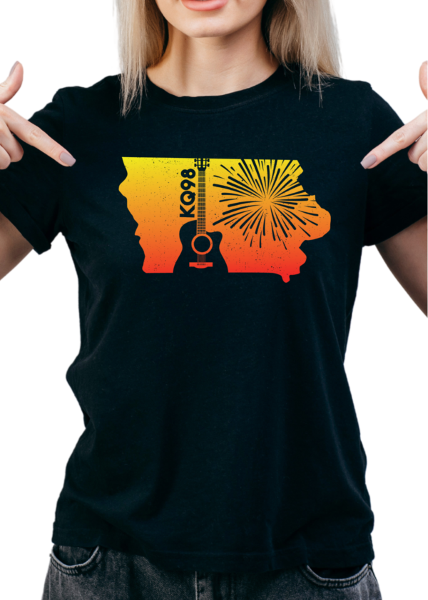 Woman in a black shirt pointing at the design of an Iowa outline